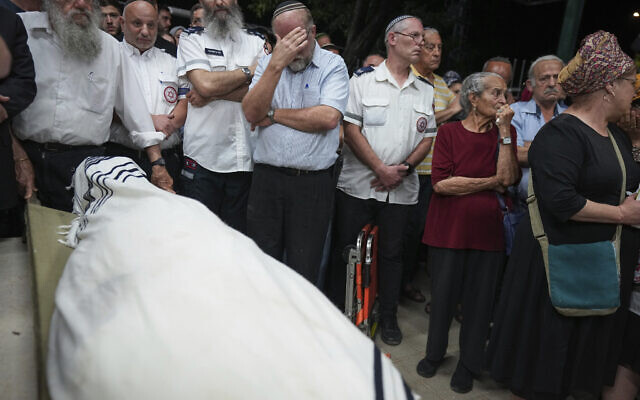 Mourners carry the body of terror victim Harel Masood, 21, during his funeral in Yesodot, June 20, 2023 (AP Photo/Tsafrir Abayov) Mourners carry the body of terror victim Harel Masood, 21, during his funeral in Yesodot, June 20, 2023 (AP Photo/Tsafrir Abayov)