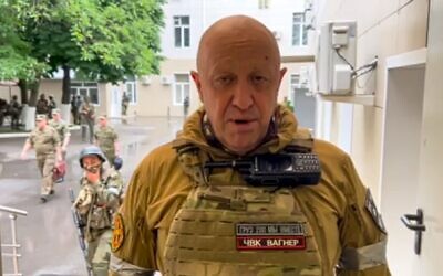 In this handout photo taken from video released by Prigozhin Press Service, Yevgeny Prigozhin, the owner of the Wagner Group military company, records a video address in Rostov-on-Don, Russia, June 24, 2023. (Prigozhin Press Service via AP)