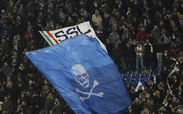 Lazio's fans shout slogans during a Serie A soccer match between Lazio and Genoa at Rome's Olympic stadium, Monday, February 9, 2015. (AP Photo/Gregorio Borgia) Lazio's fans shout slogans during a Serie A soccer match between Lazio and Genoa at Rome's Olympic stadium, Monday, February 9, 2015. (AP Photo/Gregorio Borgia)