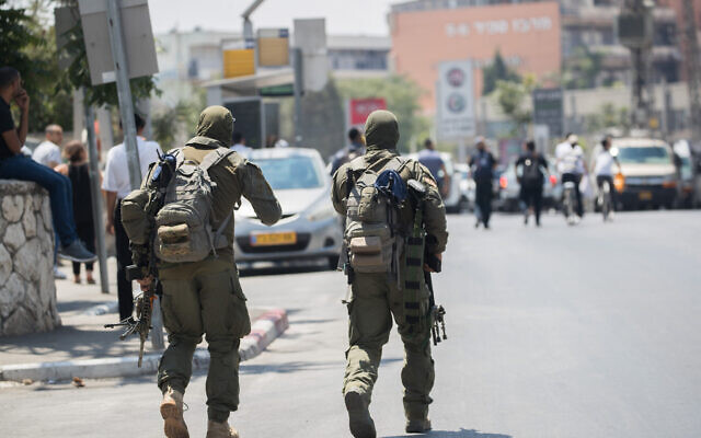 Illustrative: Members of the elite Yamam counterterrorism police unit are seen in Jerusalem, August 8, 2018. (Yonatan Sindel/Flash90) Illustrative: Members of the elite Yamam counterterrorism police unit are seen in Jerusalem, August 8, 2018. (Yonatan Sindel/Flash90)