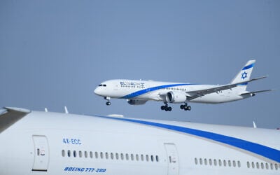 An El Al plane lands at Ben Gurion international airport on October 13, 2021. (Tomer Neuberg/Flash90)