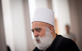 File: Muafak Tarif, head of the Druze community in Israel, at a ceremony held at the Supreme Court in Jerusalem on May 29, 2022. (Yonatan Sindel/Flash90)