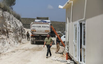Construction is carried out at the illegal West Bank outpost of Homesh, May 29, 2023. (Flash90) Construction is carried out at the illegal West Bank outpost of Homesh, May 29, 2023. (Flash90)