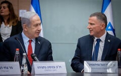 Prime Minister Benjamin Netanyahu, left, attends a Knesset Foreign Affairs and Defense Committee meeting alongside Likud MK Yuli Edelstein at the Knesset on June 13, 2023. (Oren Ben Hakoon/Flash90)