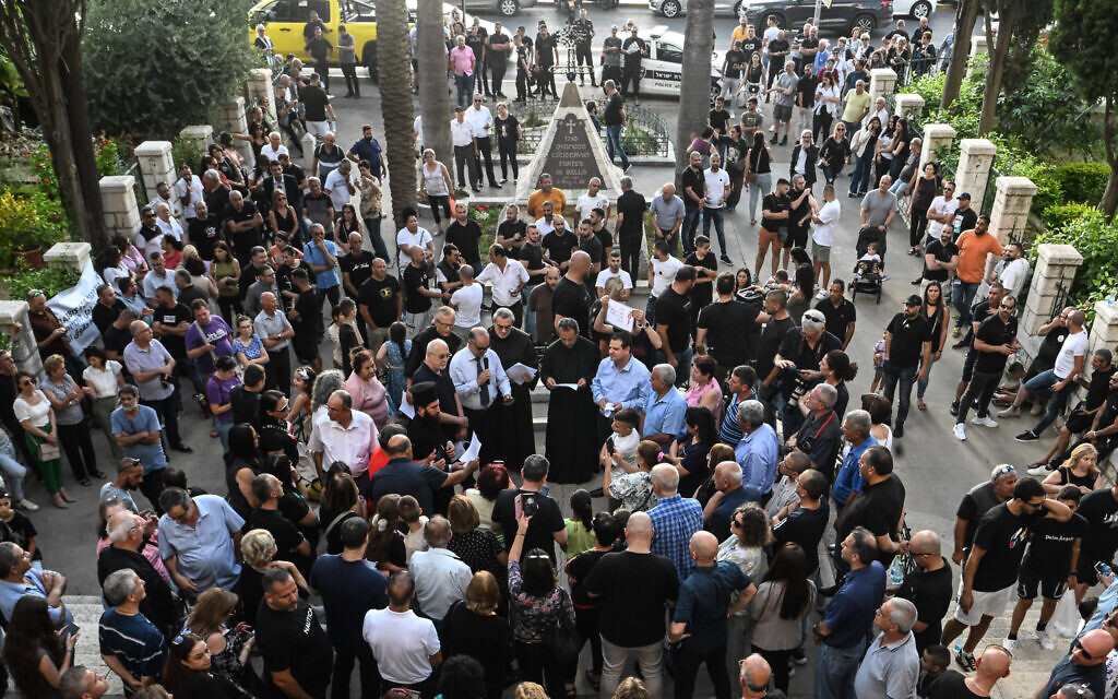 People gather for a protest at the Stella Maris Monastery in the northern Israeli city of Haifa, June 18, 2023. (Flash90) People gather for a protest at the Stella Maris Monastery in the northern Israeli city of Haifa, June 18, 2023. (Flash90)