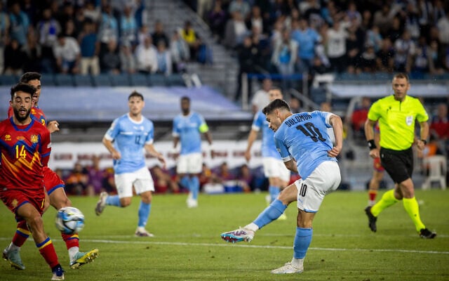 Israel's Manor Solomon shoots for goal during Israel's UEFA Euro 2024 group I qualifying round soccer match against Andorra at the Teddy Stadium in Jerusalem, on June 19, 2023. (Oren Ben Hakoon/Flash90) Israel's Manor Solomon shoots for goal during Israel's UEFA Euro 2024 group I qualifying round soccer match against Andorra at the Teddy Stadium in Jerusalem, on June 19, 2023. (Oren Ben Hakoon/Flash90)