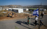 Illustrative: People at the Evyatar outpost in the West Bank, June 22, 2023. (Flash90)