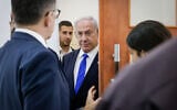 Prime Minister Benjamin Netanyahu seen at the Jerusalem District Court arriving to listen to testimony by businessman Arnon Milchan, as part of Netanyahu's corruption trial, June 28, 2023. (Marc Israel Sellem/POOL)