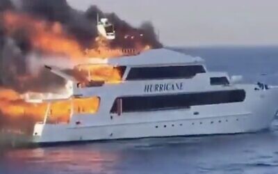 A screenshot from video shows a ship called Hurricane after it caught fire in Egypt's Red Sea, June 11, 2023. (Twitter video screenshot: used in accordance with Clause 27a of the Copyright Law)