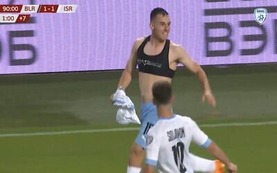Oscar Gloukh celebrates after scoring the winning goal in Israel's 2-1 defeat of Belarus at the 2024 Euro qualifiers, June 16, 2023. (Sport5 screenshot/used in accordance with Clause 27a of the Copyright Law)