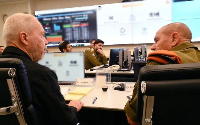 Defense Minister Yoav Gallant (left) sits with the chief of the IDF Home Front Command, Maj. Gen. Rafi Milo, at the unit's headquarters in Ramle, June 5, 2023. (Ariel Hermoni/Defense Ministry) Defense Minister Yoav Gallant (left) sits with the chief of the IDF Home Front Command, Maj. Gen. Rafi Milo, at the unit's headquarters in Ramle, June 5, 2023. (Ariel Hermoni/Defense Ministry)