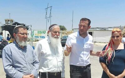Settlement leadership at Evyatar illegal West Bank outpost, June 21, 2023. From left: bereaved father Elisha Guetta, Samaria Council Municipal Chief Rabbi Elyakim Levanon, Samaria Regional Council head Yossi Dagan and Tsofia Borovsky, after whose murdered husband Evyatar the settlement is named. (Courtesy Nachala Settlement Movement)
