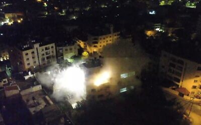 Israeli troops demolish the apartment of Osama Taweel, a Palestinian gunman accused of killing a soldier in the West Bank, in the city of Nablus, early June 15, 2023. (Israel Defense Forces)