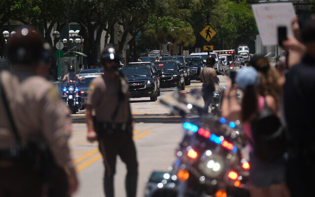 A motorcade of vehicles, with former US president Donald Trump on board, arrives at Wilkie D. Ferguson Jr. United States Federal Courthouse in Miami, Florida, on June 13, 2023. (Photo by RICARDO ARDUENGO / AFP) A motorcade of vehicles, with former US president Donald Trump on board, arrives at Wilkie D. Ferguson Jr. United States Federal Courthouse in Miami, Florida, on June 13, 2023. (Photo by RICARDO ARDUENGO / AFP)