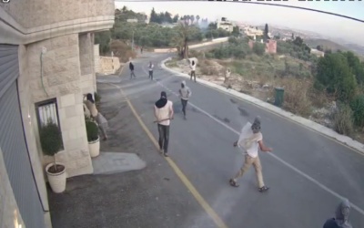 Masked Israeli settlers from the illegal Homesh outpost in the northern West Bank attack Palestinians in adjacent village of Burqa, June 4, 2023. (Courtesy)