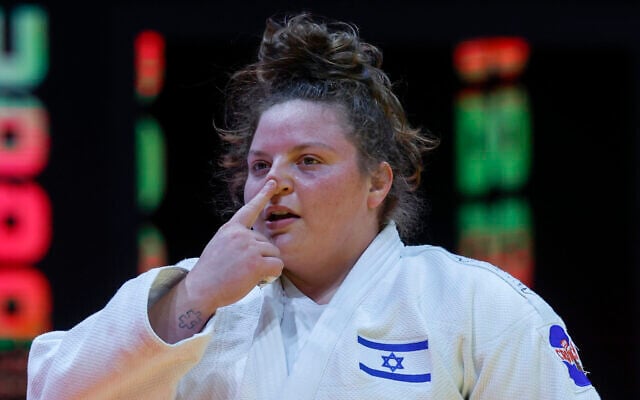 File: Raz Hershko celebrates after defeating China's Xu Shiyan (not pictured) during the women's +78Kg bronze medal bout at the World Judo Championship in Doha, Qatar, on May 13, 2023. (KARIM JAAFAR/AFP) File: Raz Hershko celebrates after defeating China's Xu Shiyan (not pictured) during the women's +78Kg bronze medal bout at the World Judo Championship in Doha, Qatar, on May 13, 2023. (KARIM JAAFAR/AFP)