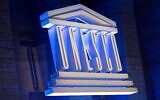 File: A photo shows the UNESCO logo during a speech by its director-general to announce the United States' request to return to the institution, at the organization's headquarters in Paris, France, on June 12, 2023. (Alain Jocard/AFP)