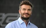 Former footballer David Beckham looks on during a promotional day with gaming brand EA Sports at the Z5 sports complex in Aix-en-Provence, southern France, on June 21, 2023. (Nicolas TUCAT / AFP)