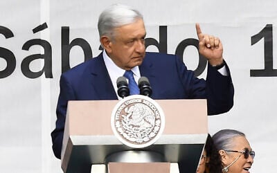 Mexican President Andres Manuel Lopez Obrador delivers a speech during a rally to commemorate the fifth anniversary of his 2018 presidential election victory at the Zocalo (main square) in Mexico City on July 1, 2023. (Claudio Cruz/AFP)