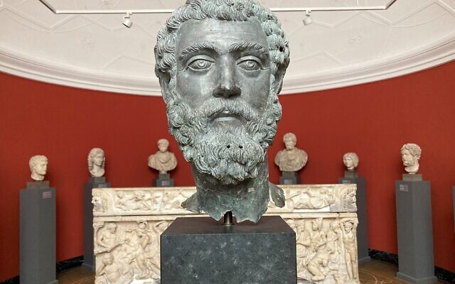 This photo, taken on June 29, 2023, shows a bronze head of Roman Emperor Septimius Severus (145 AD-211 CE), Asia Minor, ca 195-211, displayed at the Ny Carlsberg Glyptotek museum in Copenhagen. (Camille BAS-WOHLERT / AFP) This photo, taken on June 29, 2023, shows a bronze head of Roman Emperor Septimius Severus (145 AD-211 CE), Asia Minor, ca 195-211, displayed at the Ny Carlsberg Glyptotek museum in Copenhagen. (Camille BAS-WOHLERT / AFP)