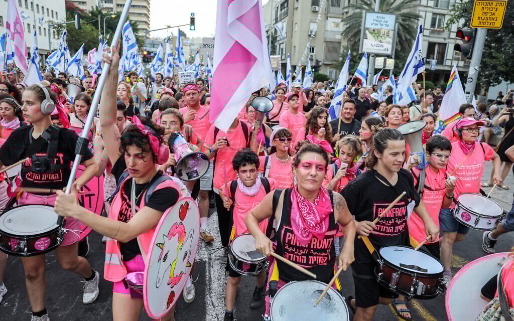 A marching band of demonstrators with drums during a protest against the Israeli government's judicial overhaul plan, in Tel Aviv on July 8, 2023. (JACK GUEZ / AFP)
