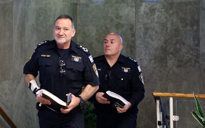 Police chief Kobi Shabtai (L) arrives to attend the weekly cabinet meeting at the Prime Minister's Office in Jerusalem on July 9, 2023. (Gil Cohen-Magen/Pool/AFP)