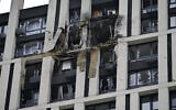A high-rise residential building damaged by remains of a shot-down Russian drone in Kyiv, amid the Russian invasion of Ukraine, July 13, 2023. (Genya SAVILOV / AFP)