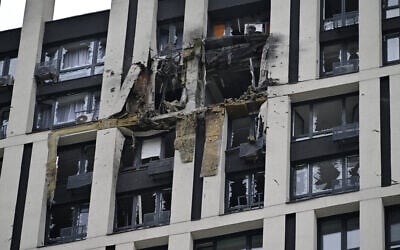 A high-rise residential building damaged by remains of a shot-down Russian drone in Kyiv, amid the Russian invasion of Ukraine, July 13, 2023. (Genya SAVILOV / AFP)
