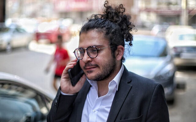 Egyptian researcher Patrick Zaki arrives at a courthouse in Egypt's northern Nile delta city of Mansoura for a trial hearing on June 21, 2022. (Mohamed El-Raai/AFP)
