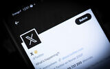 The new Twitter logo rebranded as X, is pictured in Paris on July 24, 2023. Twitter launched its new logo on July 24, 2023, replacing the blue bird with a white X on a black background, as the Elon Musk-owned company moves toward rebranding as X. (Alain Jocard/AFP)