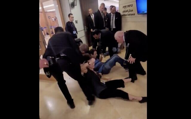 Members of the Knesset Guard forcibly remove anti-overhaul protesters on July 10, 2023. (Twitter screenshot; used in accordance with Clause 27a of the Copyright Law) Members of the Knesset Guard forcibly remove anti-overhaul protesters on July 10, 2023. (Twitter screenshot; used in accordance with Clause 27a of the Copyright Law)