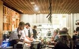 Staff prepare food at the Shila restaurant in Tel Aviv, Israel in 2019. (Courtesy of Shila)