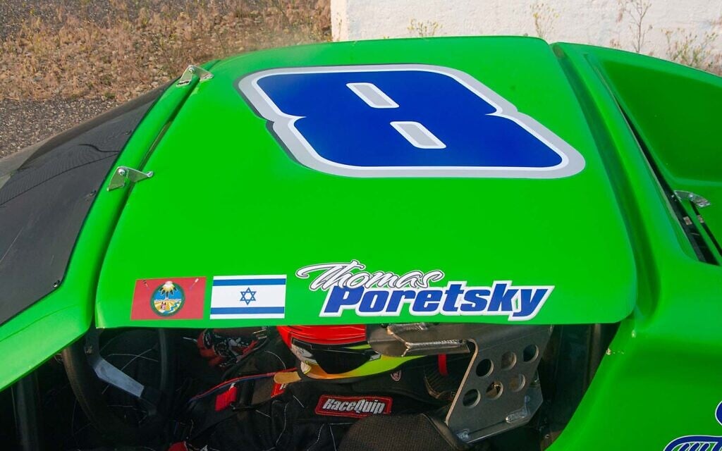 Thomas Poretsky’s car features Native American and Israeli flags. (Lonny Goldsmith/TC Jewfolk via JTA)