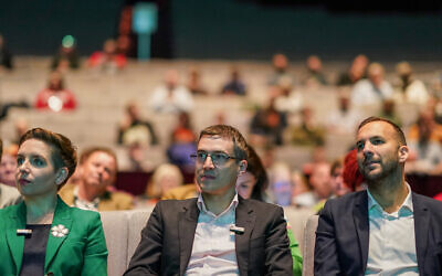Green Party co-leaders Carla Denyer, left, and Adrian Ramsay, center, sit with deputy leader Zack Polanski at the British Green Party’s conference in Harrogate, England, Sept. 30, 2022. (Ian Forsyth/Getty Images via JTA)