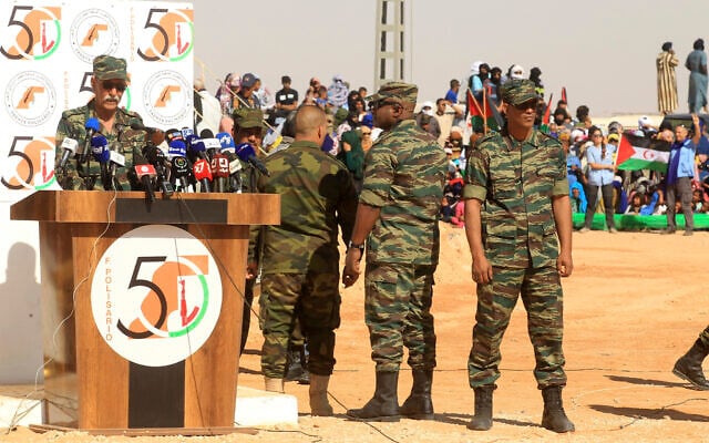 Brahim Ghali, head of the Polisario Front and the self-declared Sahrawi Democratic Arab Republic, gives a speech to celebrate the 50th anniversary of the Polisario Front in the Aoussered camp, Algeria, Saturday, May 20, 2023. (AP Photo/Guidoum Fateh) Brahim Ghali, head of the Polisario Front and the self-declared Sahrawi Democratic Arab Republic, gives a speech to celebrate the 50th anniversary of the Polisario Front in the Aoussered camp, Algeria, Saturday, May 20, 2023. (AP Photo/Guidoum Fateh)