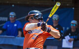 Virginia's Jake Gelof hits a home run during the eighth inning against Duke in Game 2 of an NCAA college baseball tournament super regional game, in Charlottesville, Virginia, June 10, 2023. (John C. Clark/AP)
