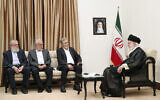 In this photo released by the office of the Iranian supreme leader, Supreme Leader Ayatollah Ali Khamenei, right, listens to Ziad Nakhaleh, the leader of Palestinian Islamic Jihad, second right, during their meeting in Tehran, Iran, June 14, 2023. (Office of the Iranian Supreme Leader via AP)