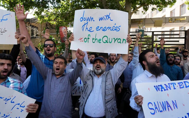 Iranian demonstrators chant slogans during a protest of the burning of a Quran in Sweden, in front of the Swedish Embassy in Tehran, Iran, June 30, 2023. (Vahid Salemi/AP) Iranian demonstrators chant slogans during a protest of the burning of a Quran in Sweden, in front of the Swedish Embassy in Tehran, Iran, June 30, 2023. (Vahid Salemi/AP)