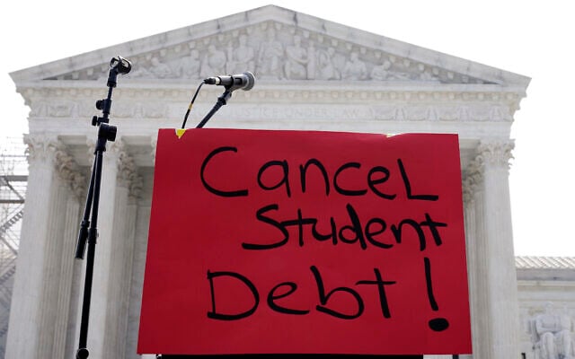A sign reading 'cancel student debt' is seen outside the Supreme Court, Friday, June 30, 2023, in Washington. (AP/Mariam Zuhaib) A sign reading 'cancel student debt' is seen outside the Supreme Court, Friday, June 30, 2023, in Washington. (AP/Mariam Zuhaib)