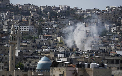 Smoke rises during an Israeli military operation of the terrorist stronghold of Jenin in the West Bank, July 3, 2023. (AP Photo/Majdi Mohammed)
