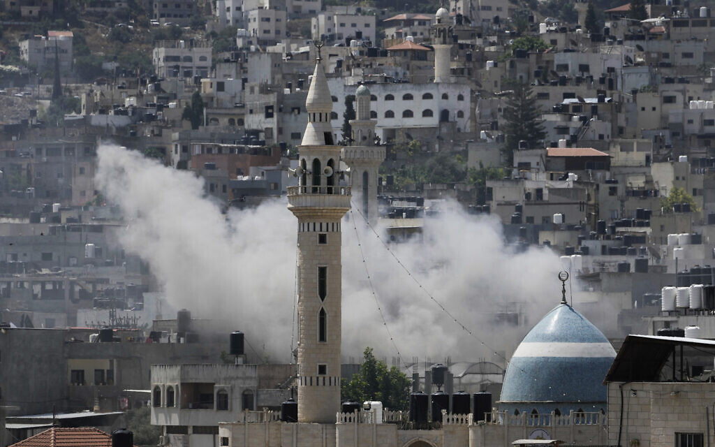Smoke rises during an Israeli military raid in Jenin on Monday, July 3, 2023. (AP Photo/Majdi Mohammed) Smoke rises during an Israeli military raid in Jenin on Monday, July 3, 2023. (AP Photo/Majdi Mohammed)