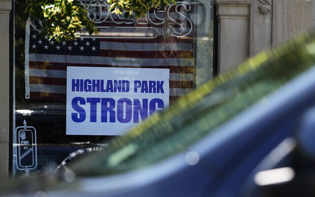A Highland Park Strong sign is displayed at a retail store in Highland Park, Illinois. July 3, 2023. (Nam Y. Huh/AP) A Highland Park Strong sign is displayed at a retail store in Highland Park, Illinois. July 3, 2023. (Nam Y. Huh/AP)