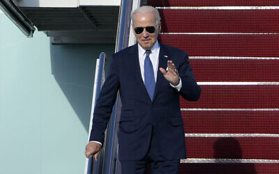 US President Joe Biden waves as he walks down the steps of Air Force One at Vilnius International Airport in Vilnius, Lithuania, July 10, 2023. (Susan Walsh/AP) US President Joe Biden waves as he walks down the steps of Air Force One at Vilnius International Airport in Vilnius, Lithuania, July 10, 2023. (Susan Walsh/AP)