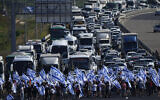 Protesters block the Tel Aviv-Haifa highway near Beit Yanai during a protest against the judicial overhaul, July 11, 2023 (AP Photo/Ariel Schalit)