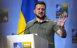 Ukraine's President Volodymyr Zelensky addresses a media conference at a NATO summit in Vilnius, Lithuania, July 12, 2023. (Pavel Golovkin/AP)