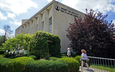 File - People walk outside the Tree of Life synagogue in Pittsburgh, Pennsylvania, July 13, 2023. (AP/Gene J. Puskar)