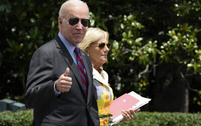 US President Joe Biden gives a thumbs up as he walks with first lady Jill Biden to board Marine One on the South Lawn of the White House in Washington, Friday, July 14, 2023, as they head to Camp David for the weekend. (AP Photo/Manuel Balce Ceneta)