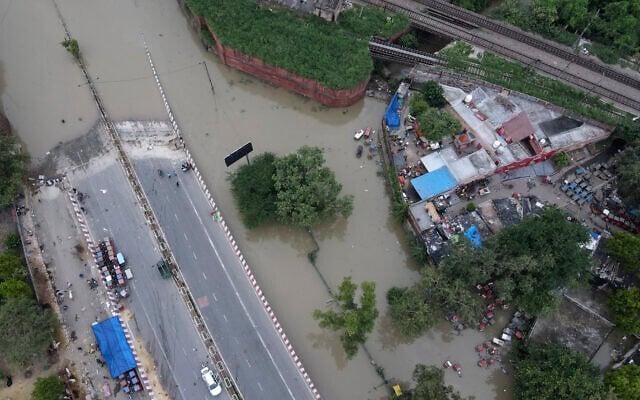 A road is inundated with water from the swollen river Yamuna in New Delhi, India, July 15, 2023. (AP Photo/Piyush Nagpal) A road is inundated with water from the swollen river Yamuna in New Delhi, India, July 15, 2023. (AP Photo/Piyush Nagpal)
