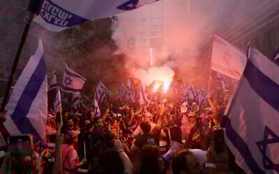 Israelis protest against plans by Prime Minister Benjamin Netanyahu's government to overhaul the judicial system in Tel Aviv, Israel, July 18, 2023. (AP Photo/Oded Balilty)