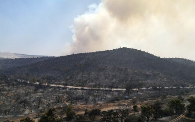 Smoke rises from a mountain during a wildfire in Mandra, west of Athens, Greece, on July 19, 2023. (AP Photo/Thanassis Stavrakis) Smoke rises from a mountain during a wildfire in Mandra, west of Athens, Greece, on July 19, 2023. (AP Photo/Thanassis Stavrakis)